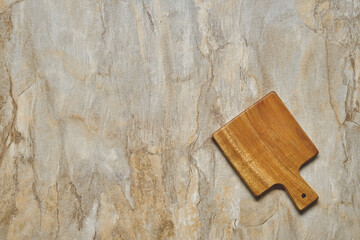 Empty serving board on wooden background