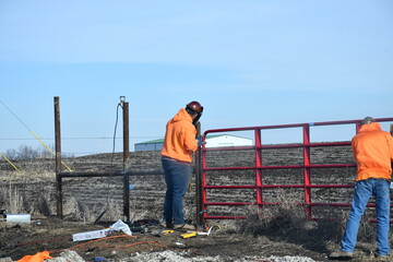 Men Working on a Fence