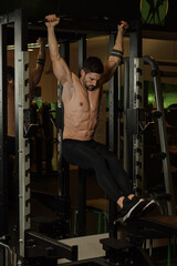 Strong Guy is training in the gym.