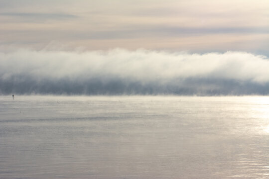 Morning fog clouds rolling over the Potomac River