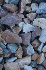 Natural stone. Colorful pebbles on the beach