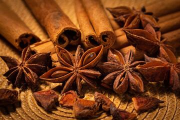 Star Anise with Cinnamon Sticks on Woven Mat