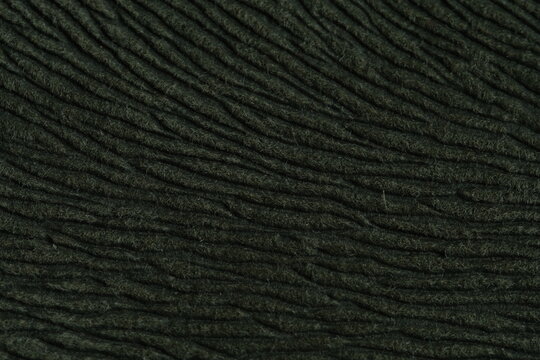 Military green hairy natural fur pattern texture background. Image photo