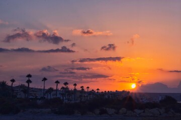 Sunrise at the beach and the rowers training in Spain © ruthlaguna