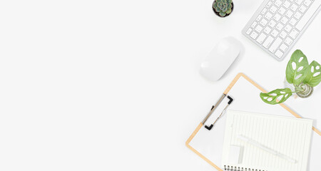 Minimal Office desk table top view with office supply and coffee cup on a white table with copy space, White color workplace composition, flat lay