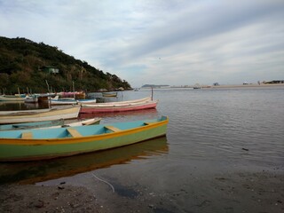 Naklejka na ściany i meble boats on the beach