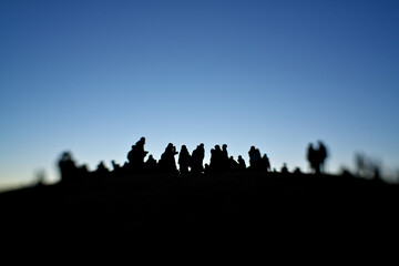 Fototapeta na wymiar Tokyo,Japan-January 1, 2021: Silhouette of people on a hilltop 