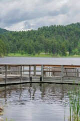 Fototapeta premium Fishing dock on lake in the Black Hills, South Dakota