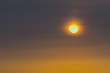 The sun, the sky sunset sun and clouds, bright twilight background. Everything lies above the surface of the atmosphere.