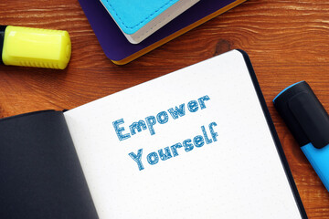 Financial concept about Empower Yourself with sign on the piece of paper.