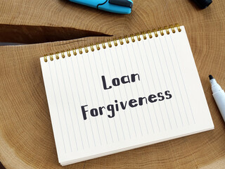 Conceptual photo about Loan Forgiveness with handwritten text.