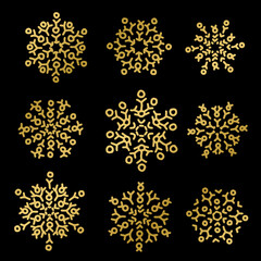 Gold snowflakes set on black background. Vector illustration.