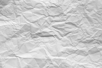Obraz premium White crumpled paper texture background.