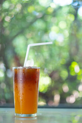 Iced black coffee mixed with fresh orange juice