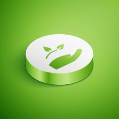 Isometric Leaf in hand of environmental protection icon isolated on green background. Seed and seedling. Planting sapling. Ecology concept. White circle button. Vector.