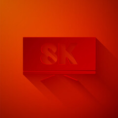 Paper cut Screen tv with 8k Ultra HD video technology icon isolated on red background. Paper art style. Vector.