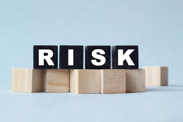 RISK. The text is on the dark and light cubes. Bright solution for business, financial, marketing concept