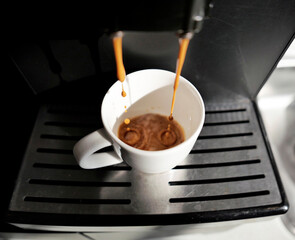 Making espresso coffee on a coffee machine