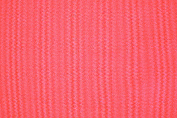 Close up background of living coral color fabric or orange fabric pattern use for web design and wallpaper background 