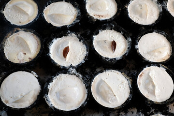 Close up raw material of natural rubber or white liquid of rubber latex in the bowl use for agriculture background