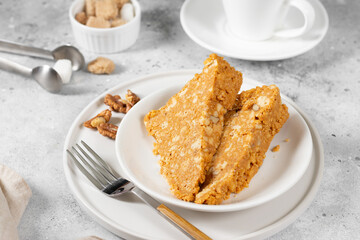 Cake Anthill. Cake made of cookies, walnuts with condensed milk. Walnut cake. Home-made traditional pastries. Soviet pastries	