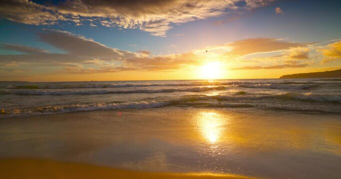 Ocean beach sunrise, 4K slow motion video