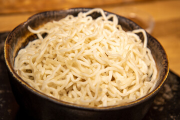 A bowl of cooked noodles