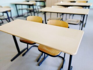 A classroom of empty chairs as many school children stay at home due to the Corona virus. Students doing state exams and younger secondary students have returned lately - 402535035