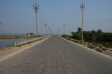 a straight road to coast of west bengal