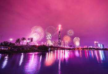Throw pillow High resolution image of colorful fireworks of Ho Chi Minh City at new year 2021 view from Landmark 81 riverside.