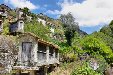 Typical stone corn driers, called Espigueiros near Sistelo, north of Portugal