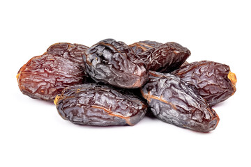 Amazing dates fruit isolated on white background. Pile of dried premium dates close-up.