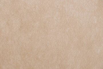 Fototapeta na wymiar Beige surface background texture light rough textured spotted blank copy space background in beige yellow,brown.