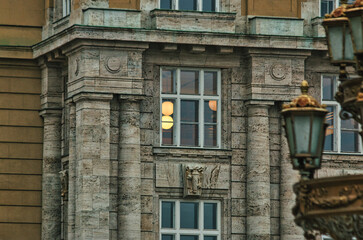 offices with warm light inside buildings cold autumn morning warm cold contrast