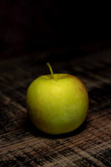 apple on a wooden table