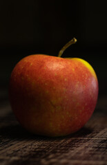 red apple on wooden background