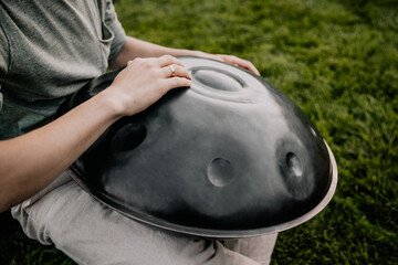 close up musician Playing Handpan