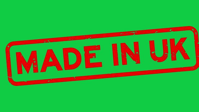 Grunge red made in UK (United Kingdom) word rubber seal stamp zoom on green background