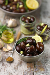 Pickled plums in bowls. Fermented foods.