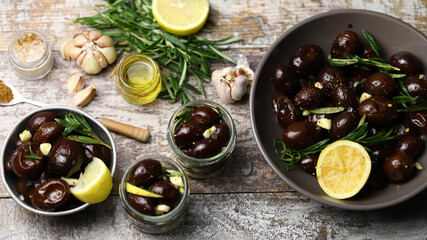Pickled plums in bowls. Fermented foods.