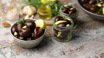 Pickled plums in bowls. Fermented foods.