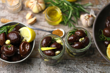 Pickled plums in bowls. Fermented foods.