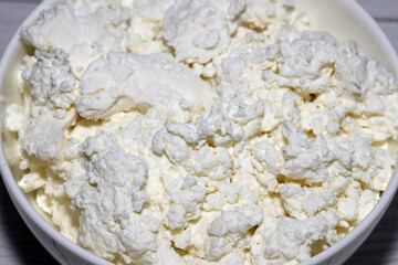 natural cottage cheese close up, healthy food