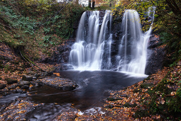 Fototapeta na wymiar Waterfall at Glenariff Forest Park, Northern Ireland, UK
