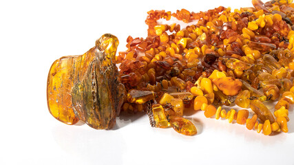 Big piece of luxurious yellow Baltic amber and variety of different of colors old amber necklaces...