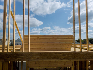 Wood building frame structure on a new development