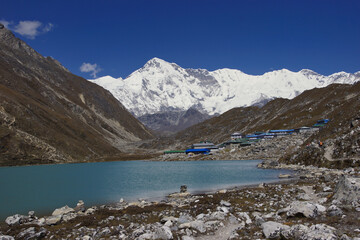 Gokyo Village with Gokyo Lake in the Foreground and Kangchung Peak in the Background. Gokyo Ri on the left side (Beautiful view point on Mt. Everest)