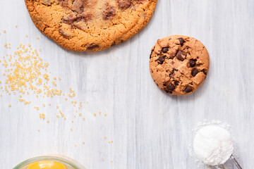 Organic fresh bake homemade food snack tasty sweet dessert piece of salted cookie chocolate chip flour egg closeup on dark wooden table for holiday new year Christmas gift decorate with sugar sparkle