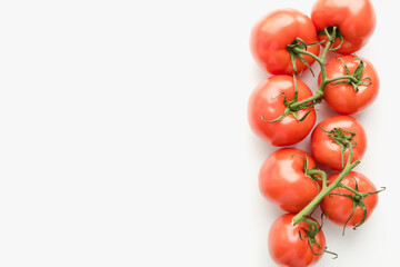 Tomatoes on a white background, tomatoes with a sprig