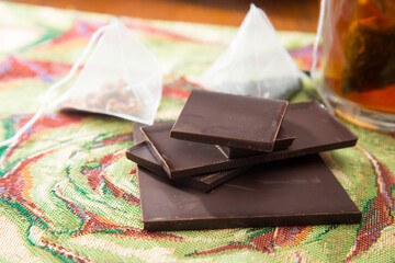 Dark chocolate on the table. Homemade tea party.